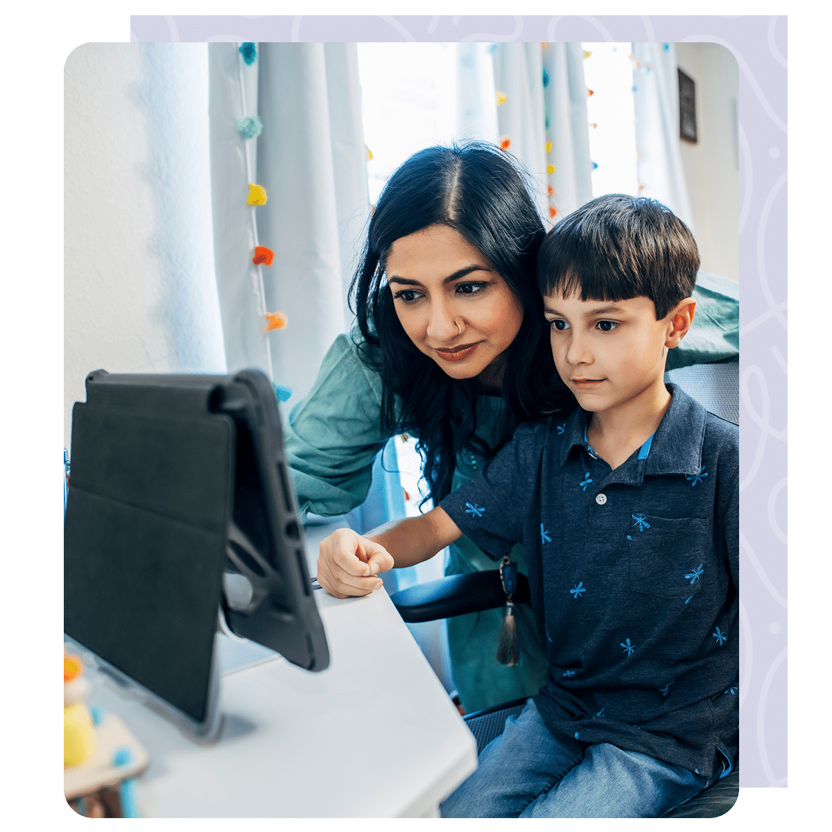 Telehealth-Swift-Creek Mother and son looking tablet telehealth appointment